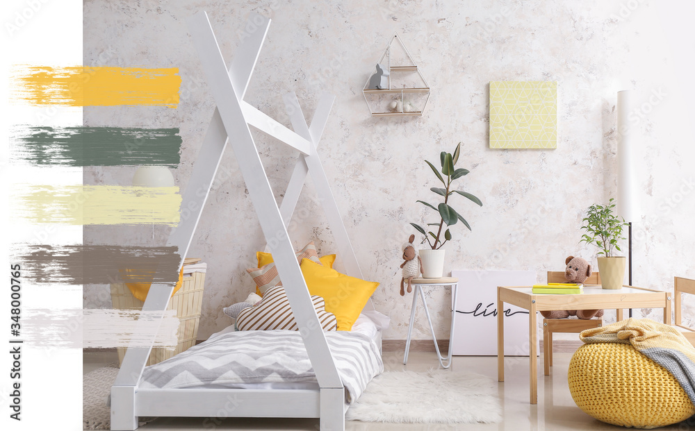 Interior of modern childrens room with comfortable bed. Different color patterns