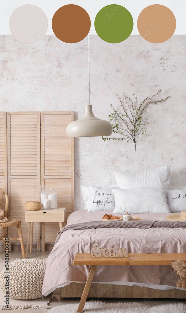 Interior of beautiful modern bedroom with spring flowers. Different color patterns