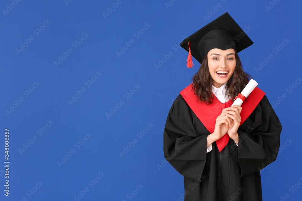 Female graduating student with diploma on color background