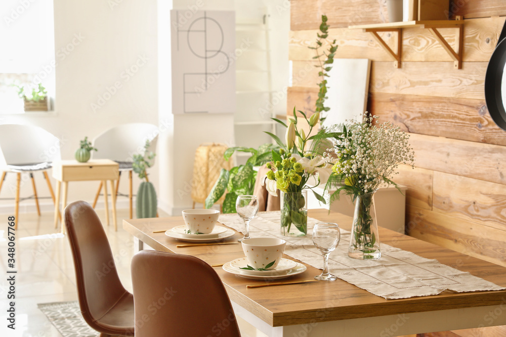 Served table in modern dining room