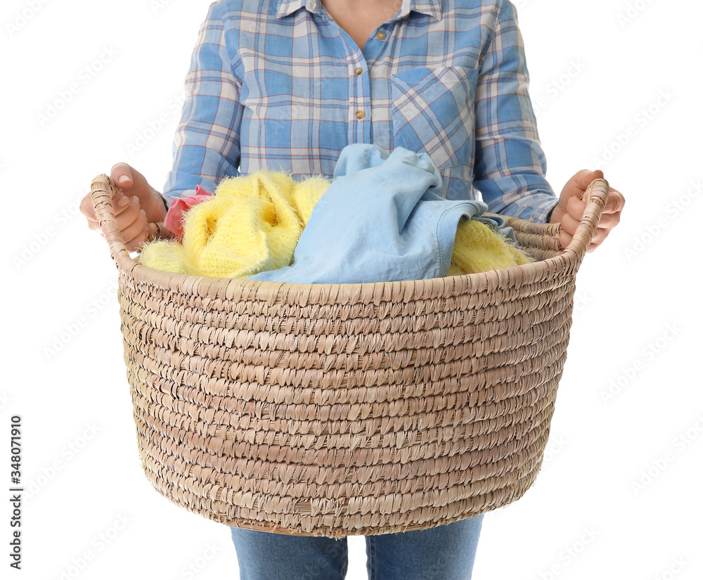 Woman with basket of laundry on white background