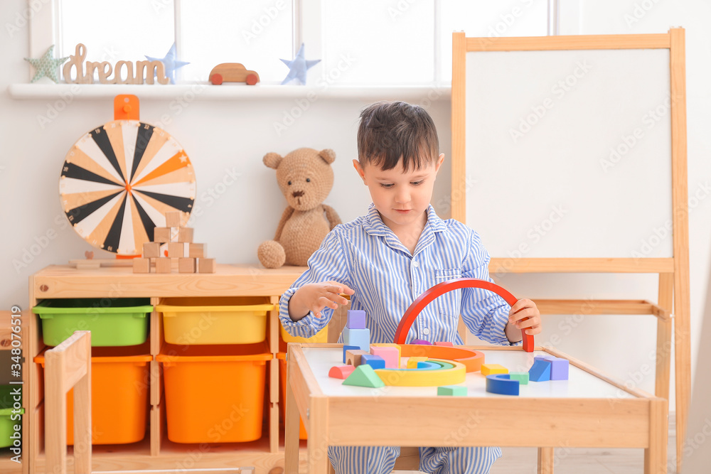 Little boy playing at home