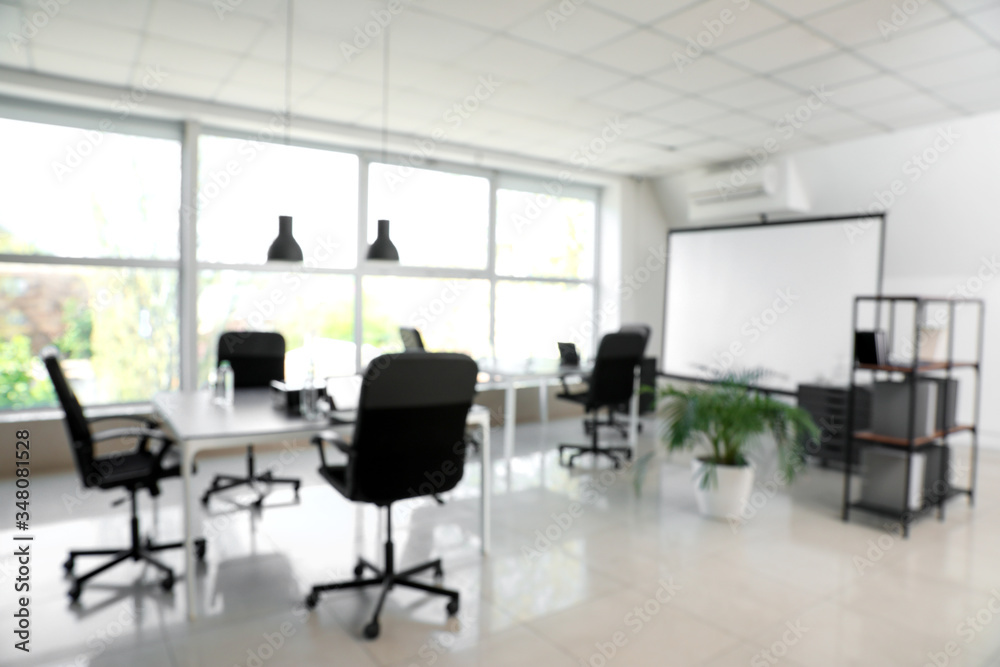 Interior of stylish modern office, blurred view