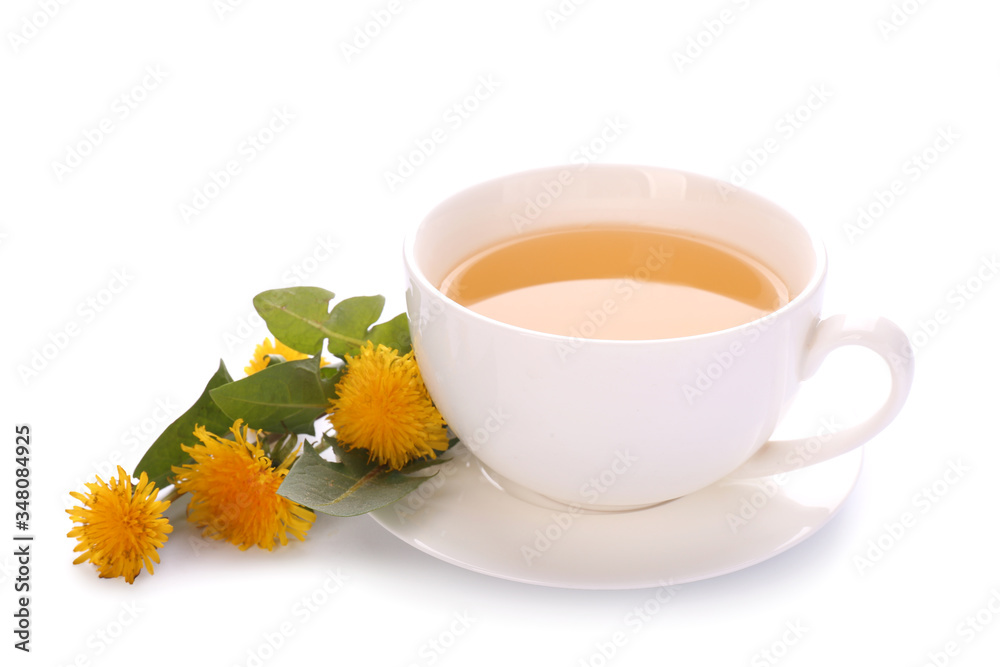 Cup of healthy dandelion tea on white background