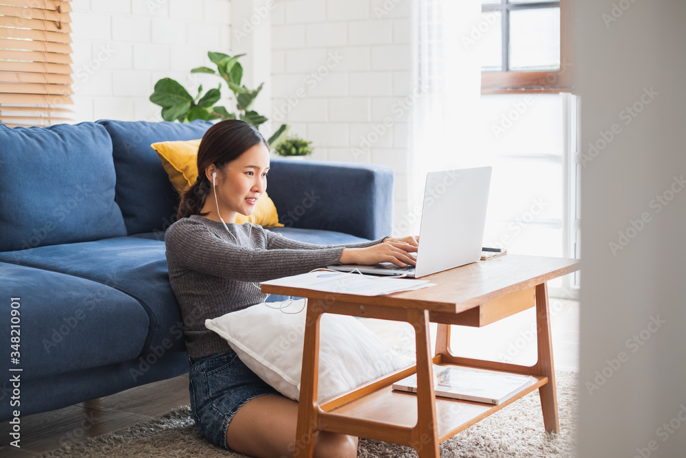 Asian woman virtual conference meeting video call and work at home office