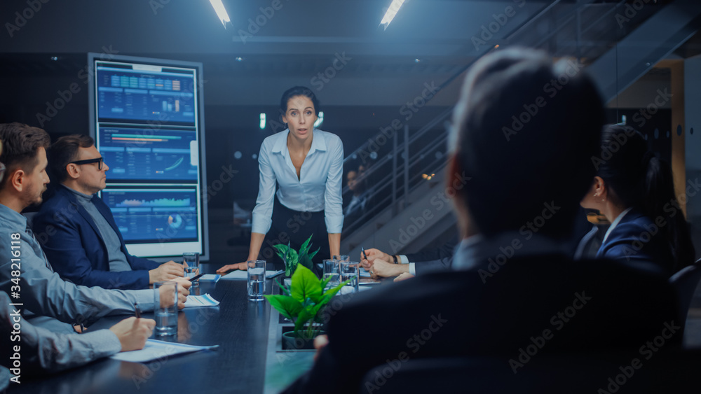 Late at Night in Meeting Room: Confident Female Executive Director Stands in the Head of the Confere