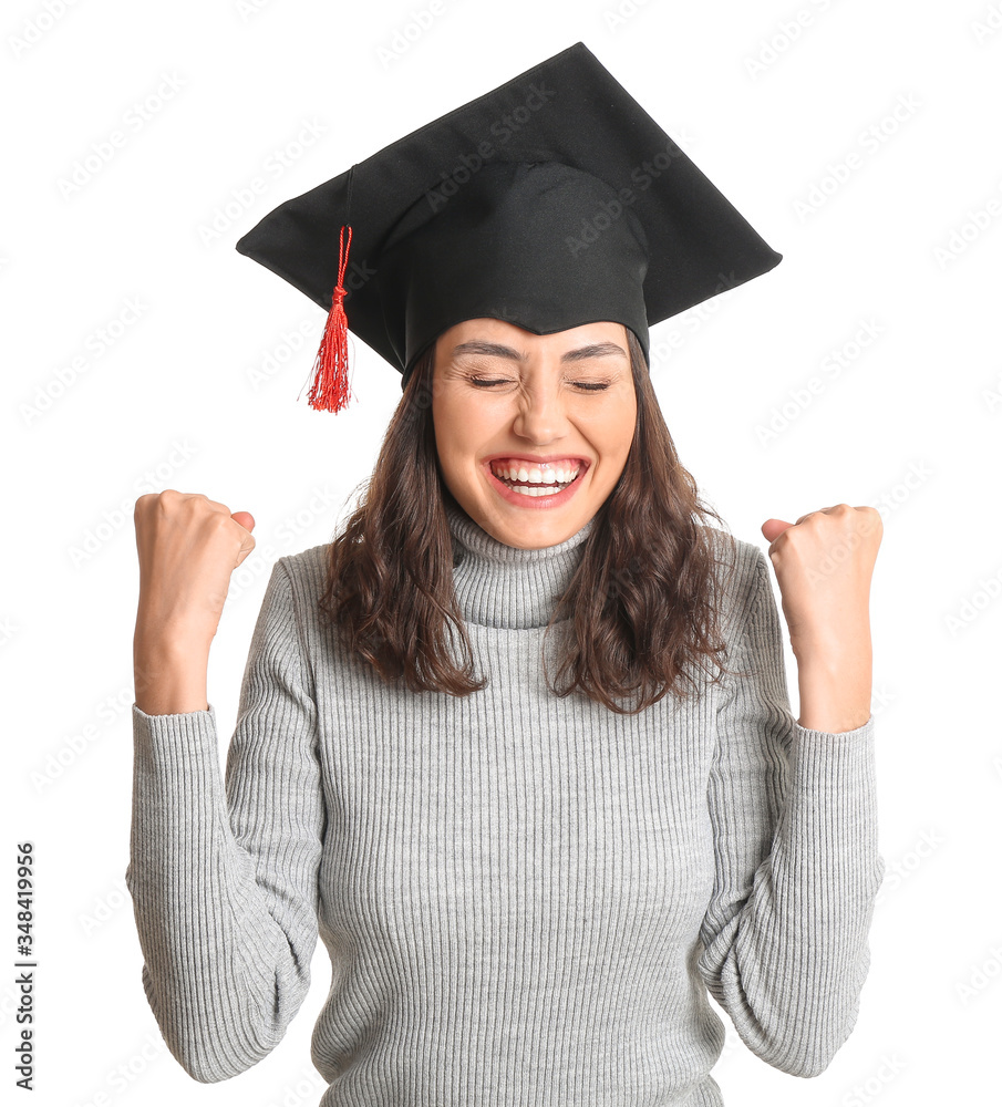 Happy female graduating student on white background