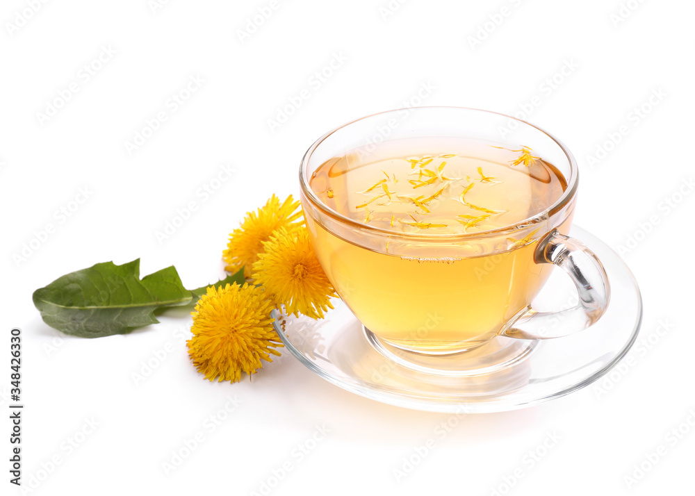 Cup of healthy dandelion tea on white background