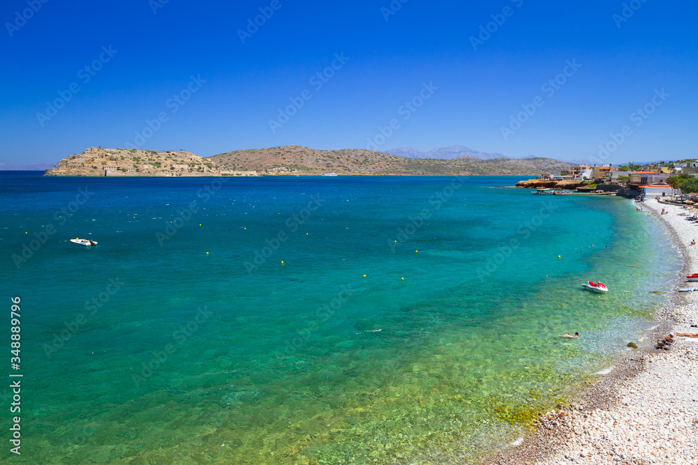 Turquise water of Mirabello bay at the coastline of Crete, Greece