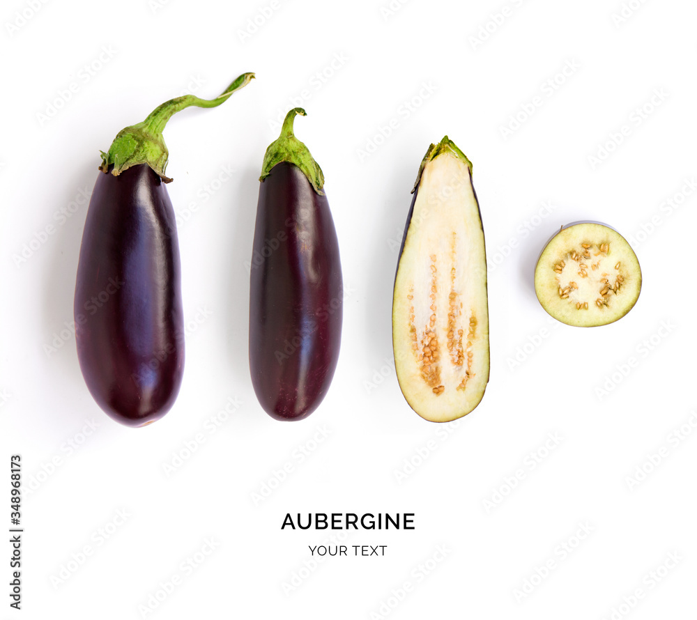 Creative layout made of aubergine. Flat lay. Food concept. Vegetables isolated on white background.