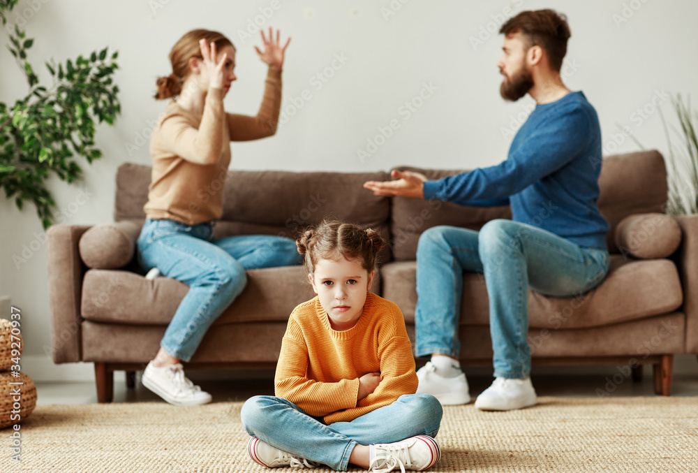 Annoyed parents arguing with each other in front of daughter.