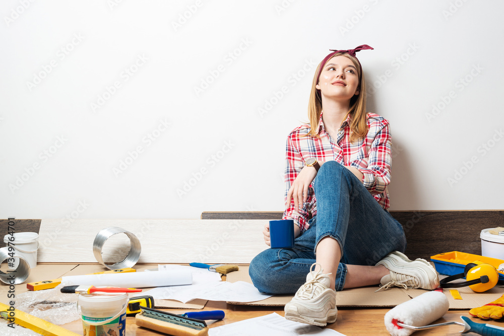 Smiling girl relaxing with coffee at home