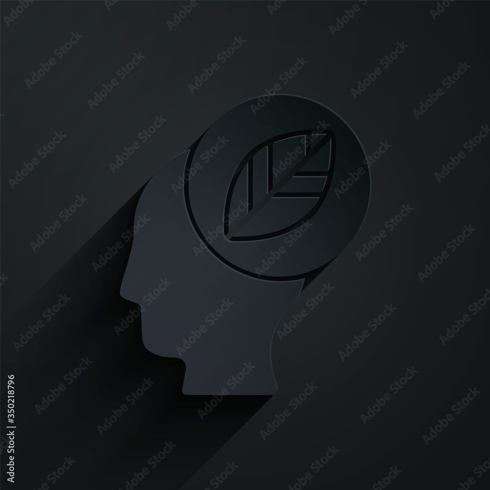 Paper cut Human head with leaf inside icon isolated on black background. Paper art style. Vector Ill