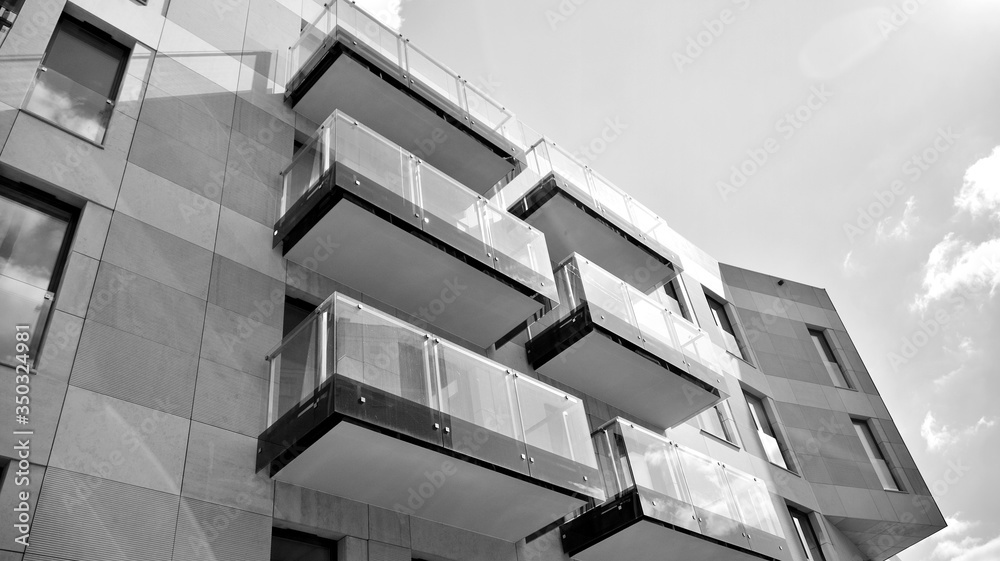 Detail of modern residential flat apartment building exterior. Fragment of new luxury house and home