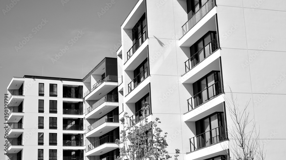 Detail of modern residential flat apartment building exterior. Fragment of new luxury house and home