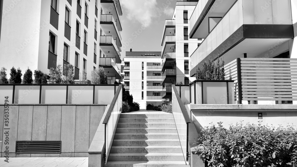 Detail of modern residential flat apartment building exterior. Fragment of new luxury house and home