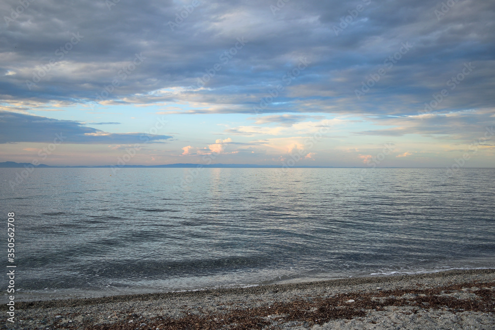 Cloudy sunset over the sea at Therma beach – Samothraki island, Greece, Aegean sea