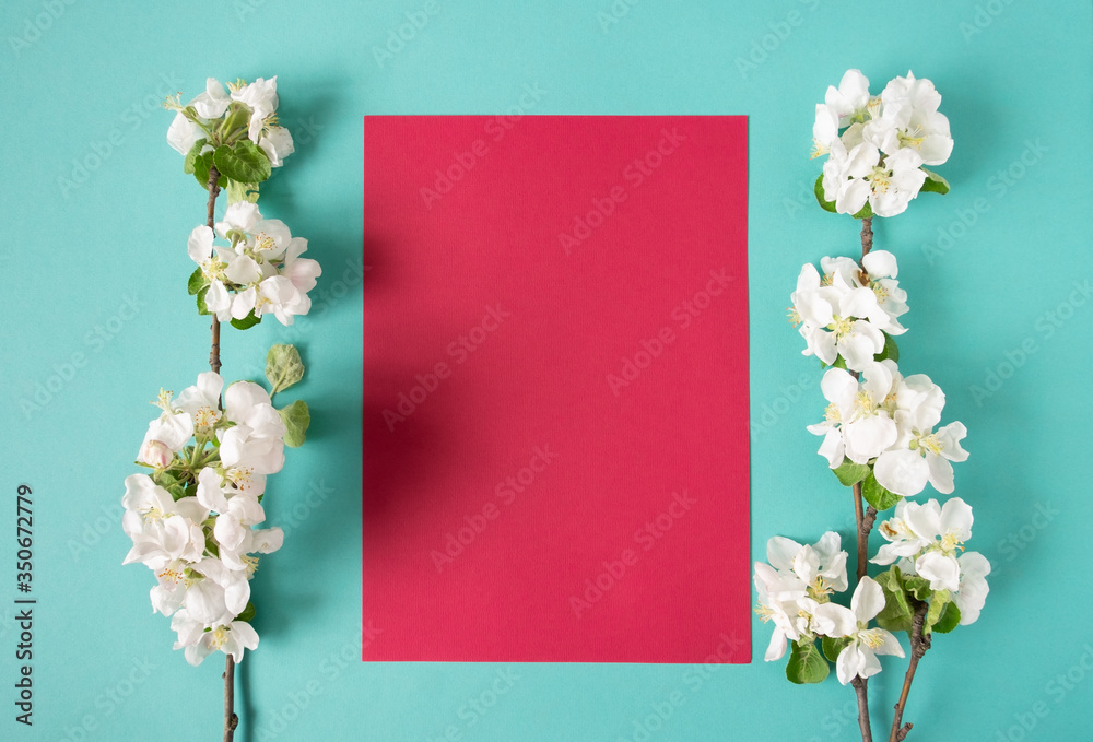 Greeting card with spring apple blossom branches