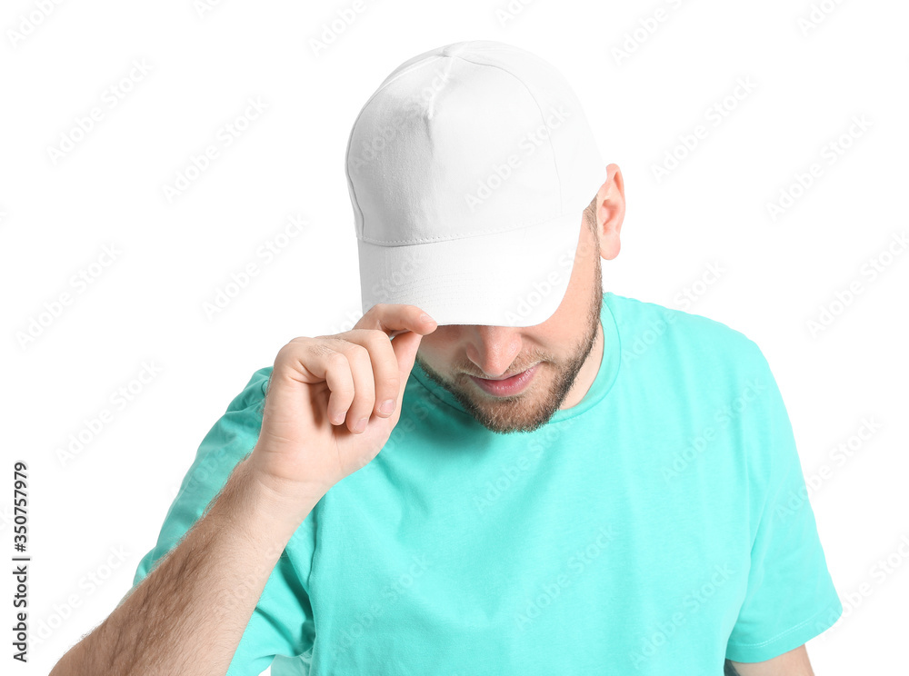 Handsome man in stylish cap on white background