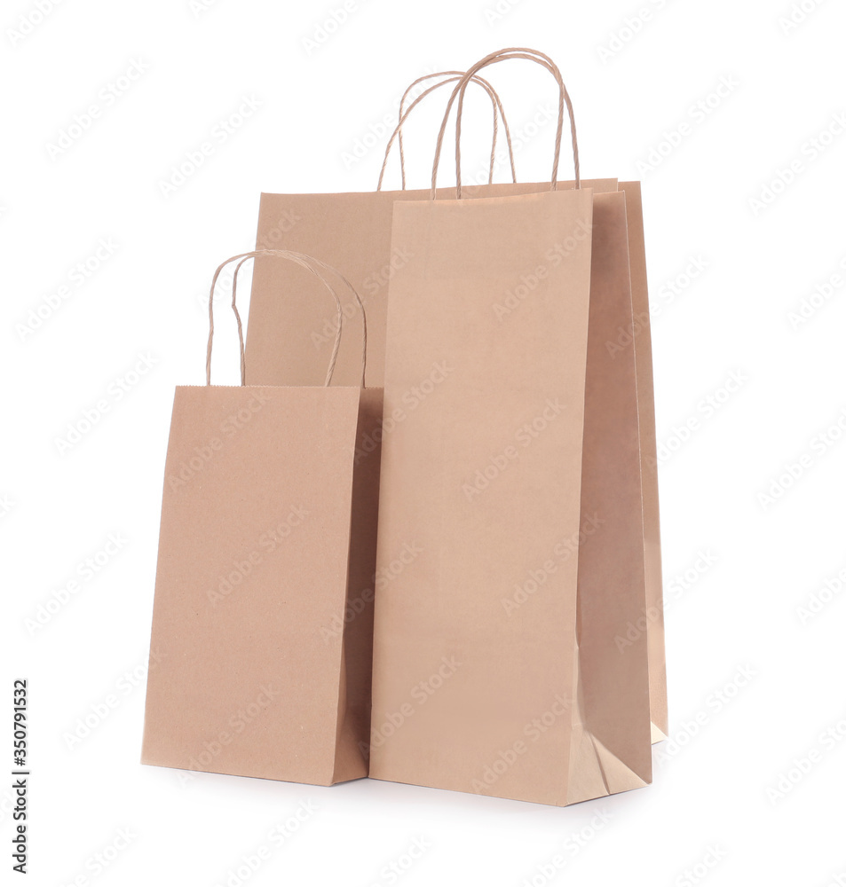 Paper shopping bags on white background