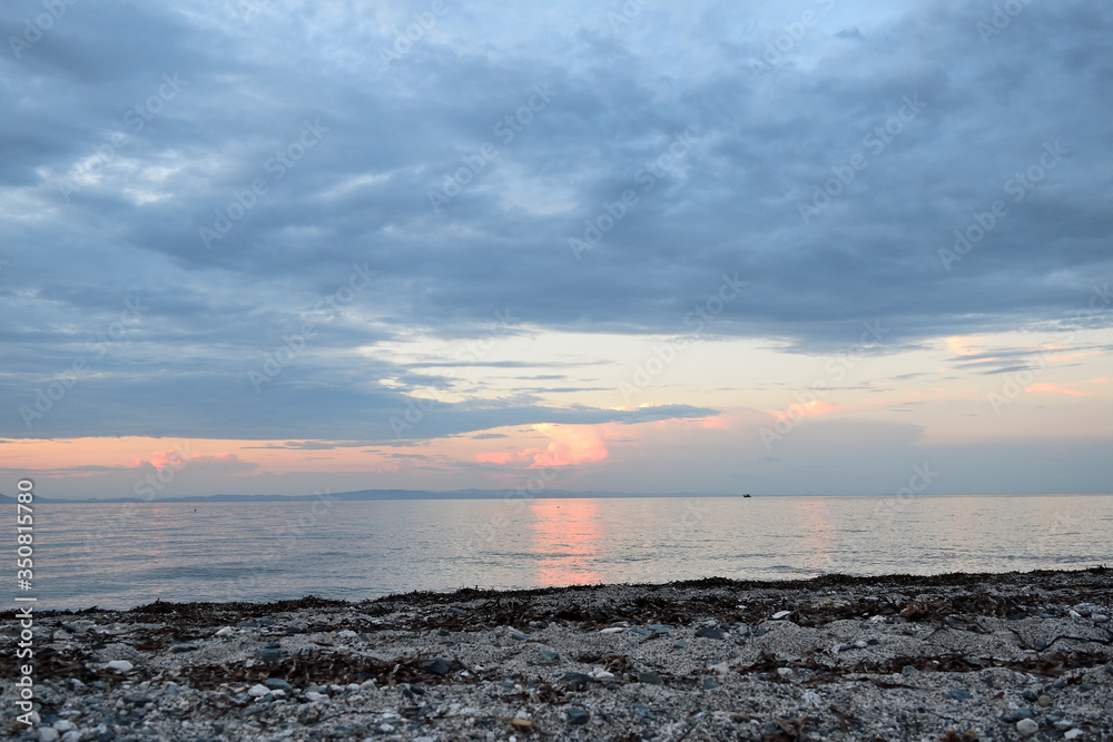 Cloudy sunset over the sea at Therma beach – Samothraki, Greece