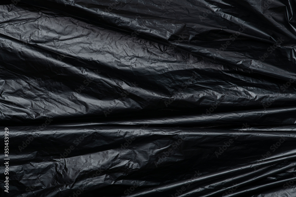 Disposable black garbage bag texture