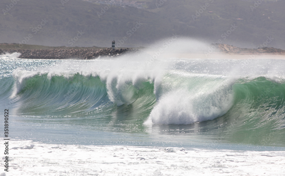 Wave on the beach of Nazare Portugal