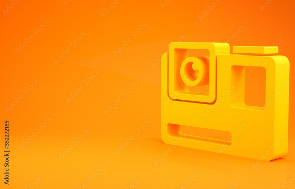 Yellow Action extreme camera icon isolated on orange background. Video camera equipment for filming 