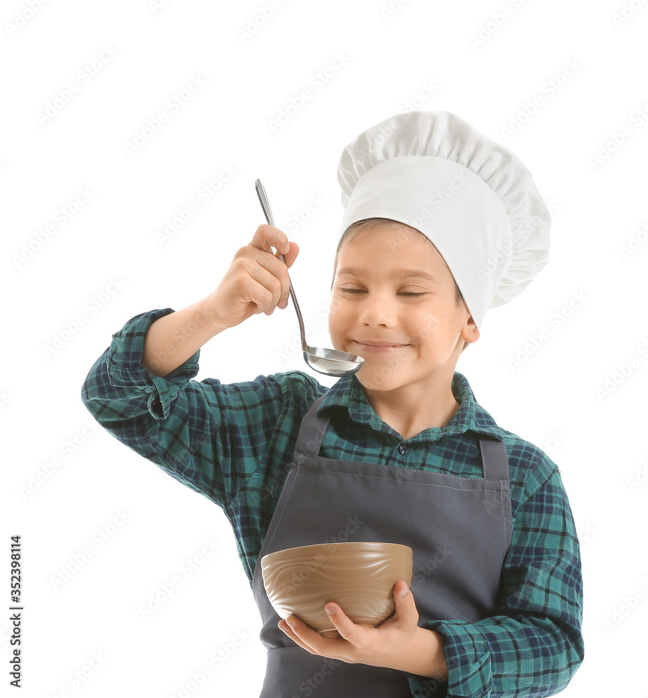 Portrait of little chef on white background