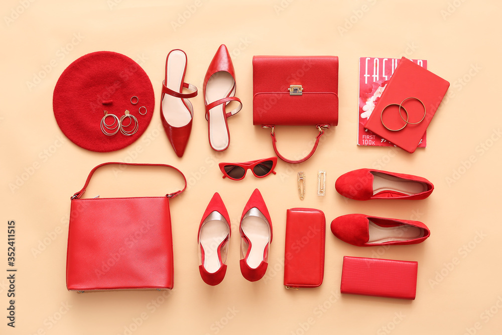 Female accessories on color background