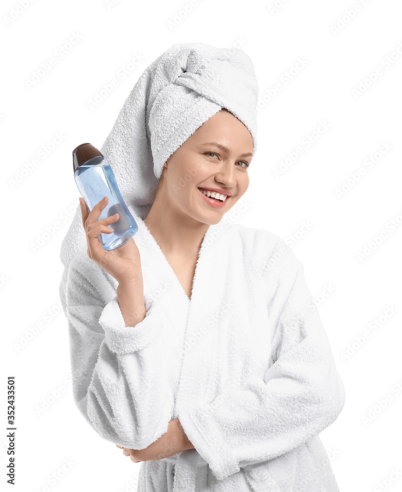 Beautiful young woman with shower gel on white background