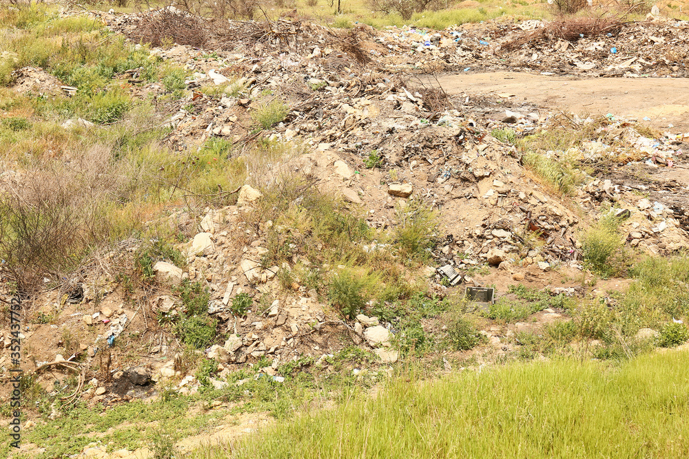 View of landfill outdoors. Concept of soil pollution