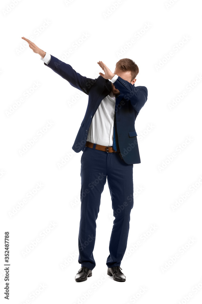 Handsome dancing businessman on white background