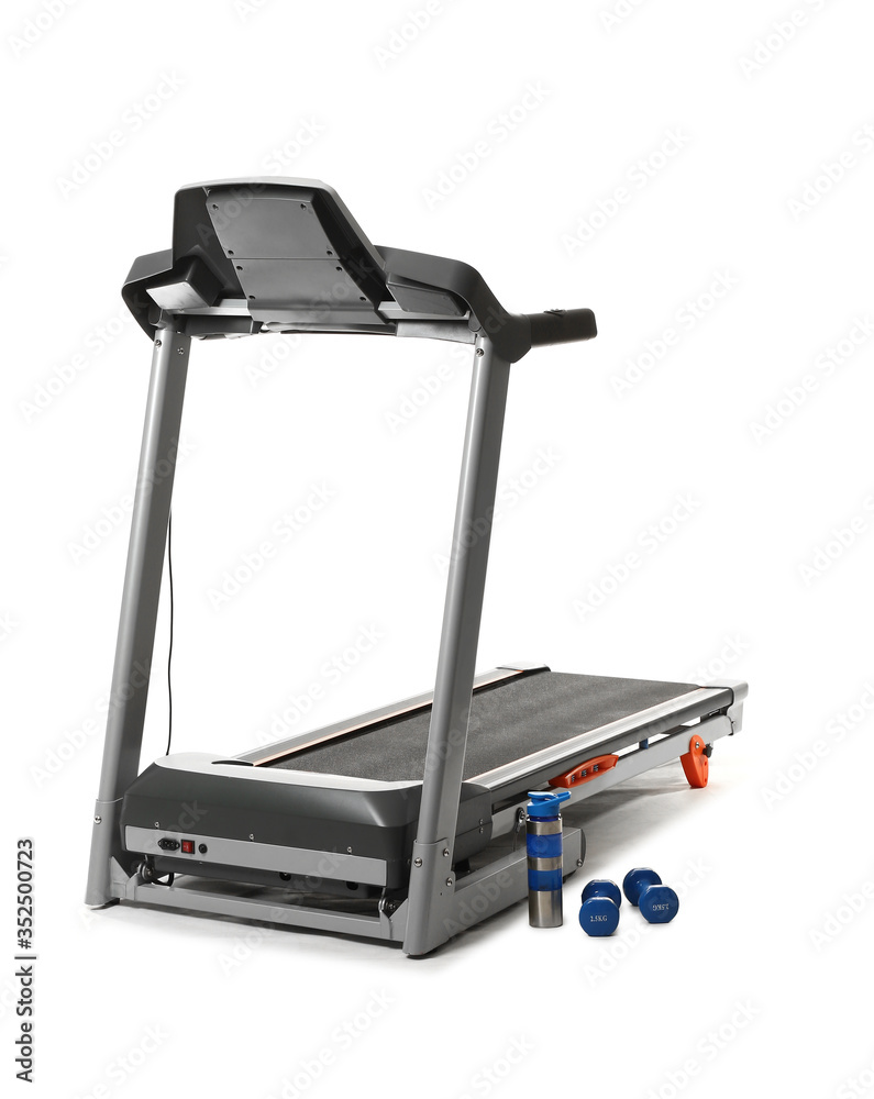 Modern treadmill on white background