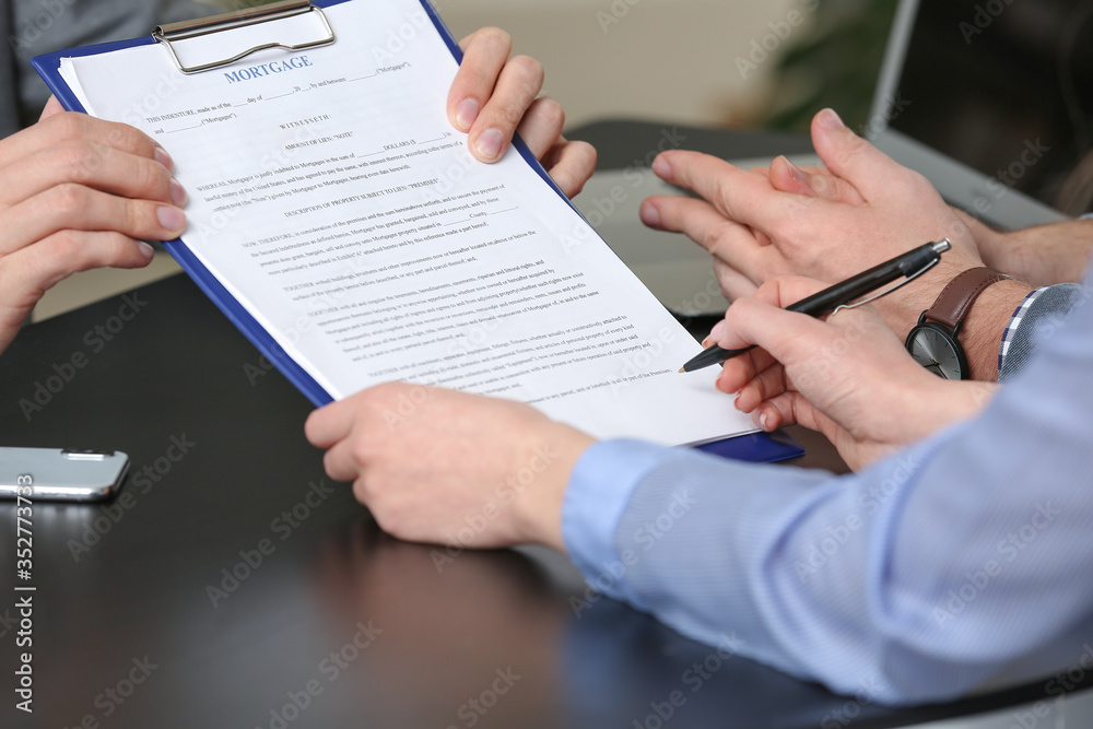 Couple visiting lawyer in office