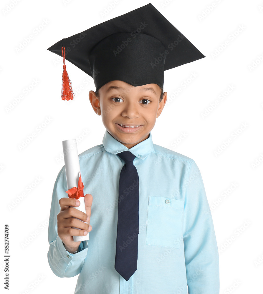 Little African-American boy in graduation hat and with diploma on white background