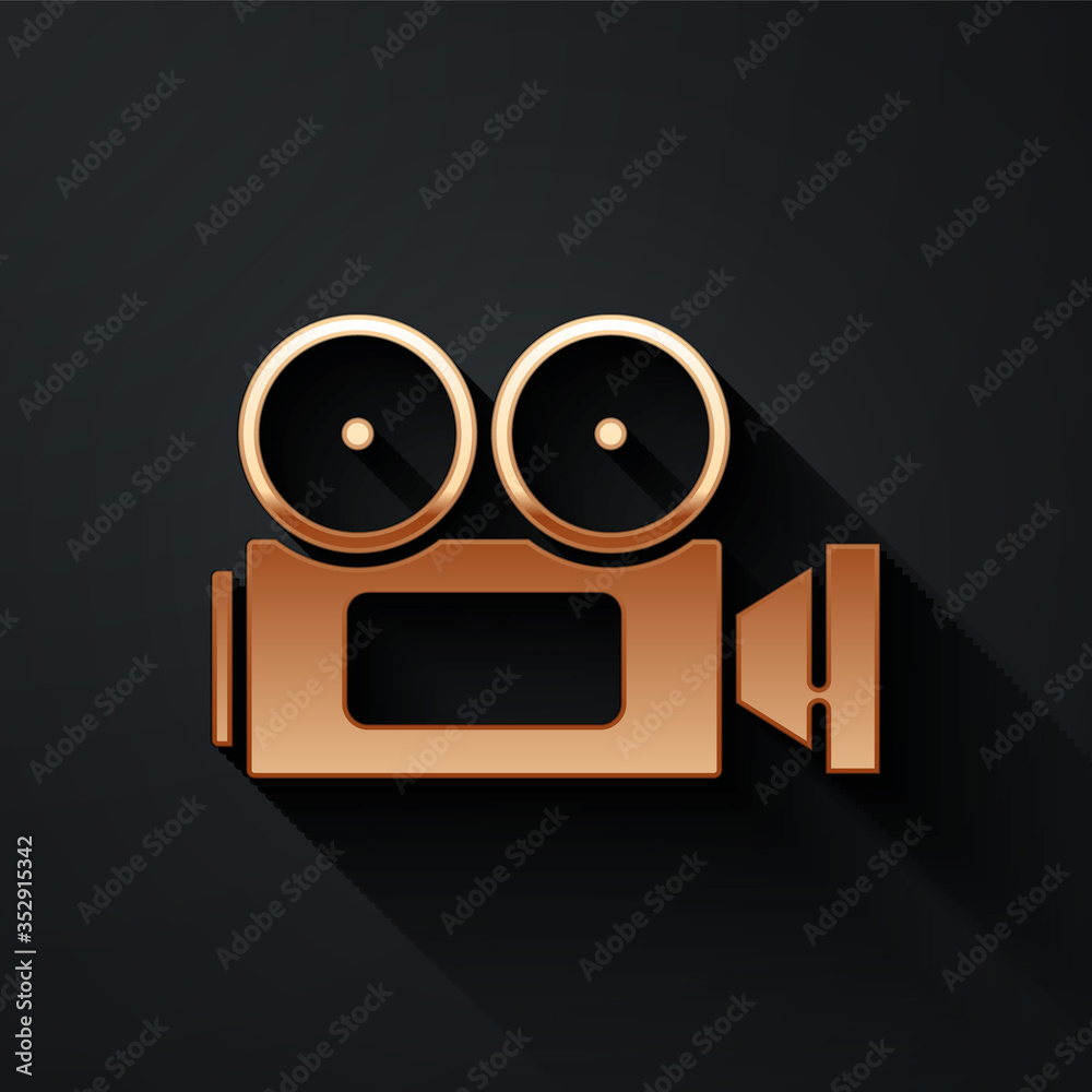 Gold Cinema camera icon isolated on black background. Video camera. Movie sign. Film projector. Long