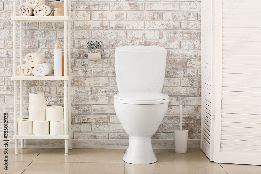 Interior of bathroom with toilet bowl