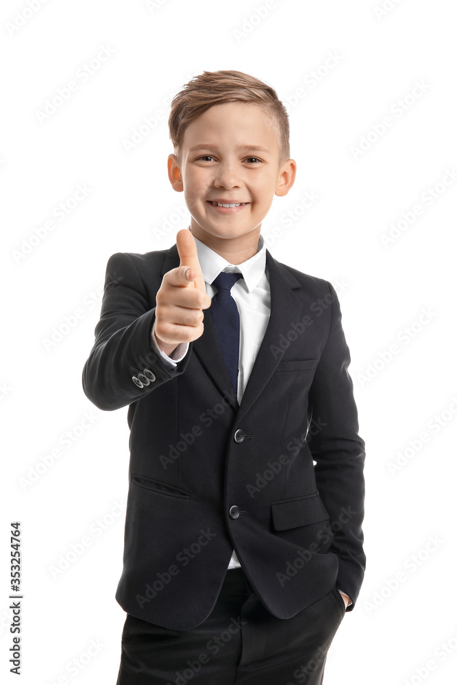 Portrait of little secretary pointing at viewer on white background