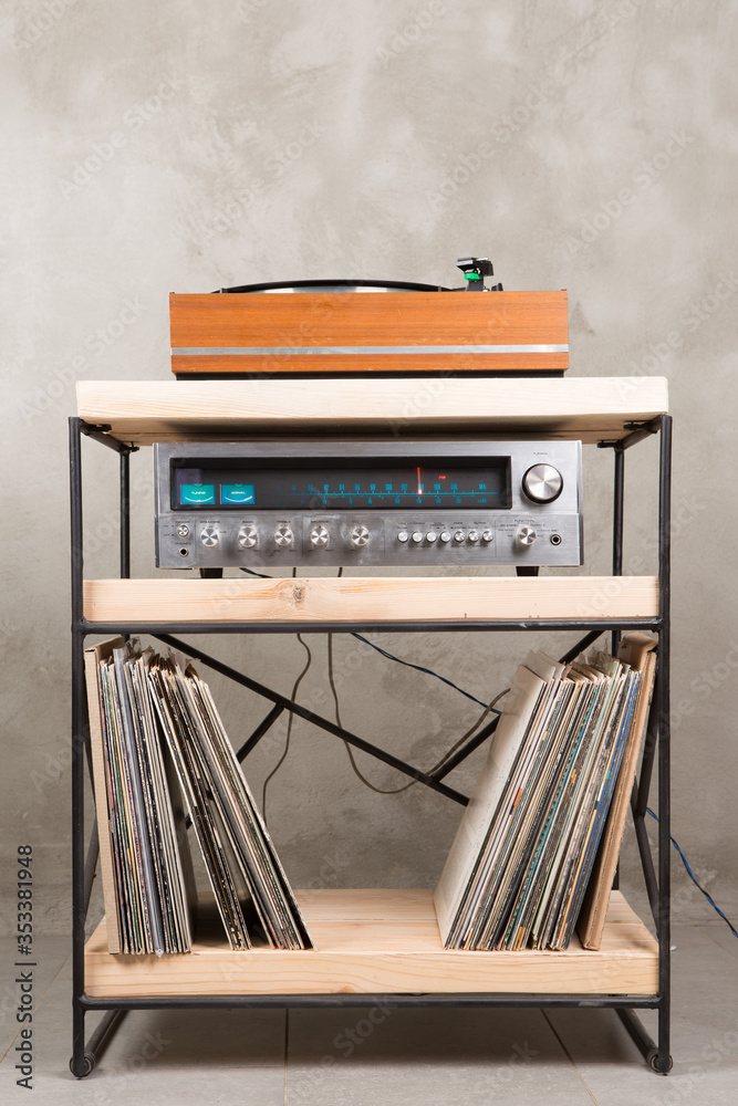 HiFi system with turntable, amplifier and speakers in a studio