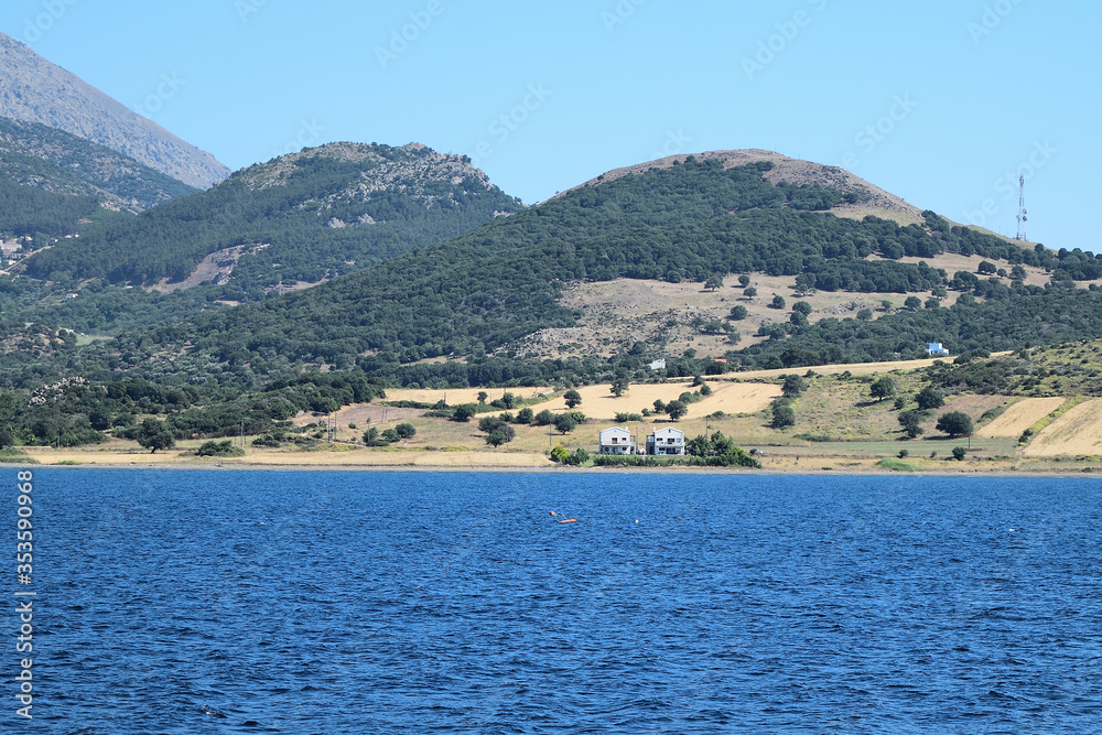 Seascape with Saos mountain and coastline Potamia area - Samothraki island view from ferry - Greece,