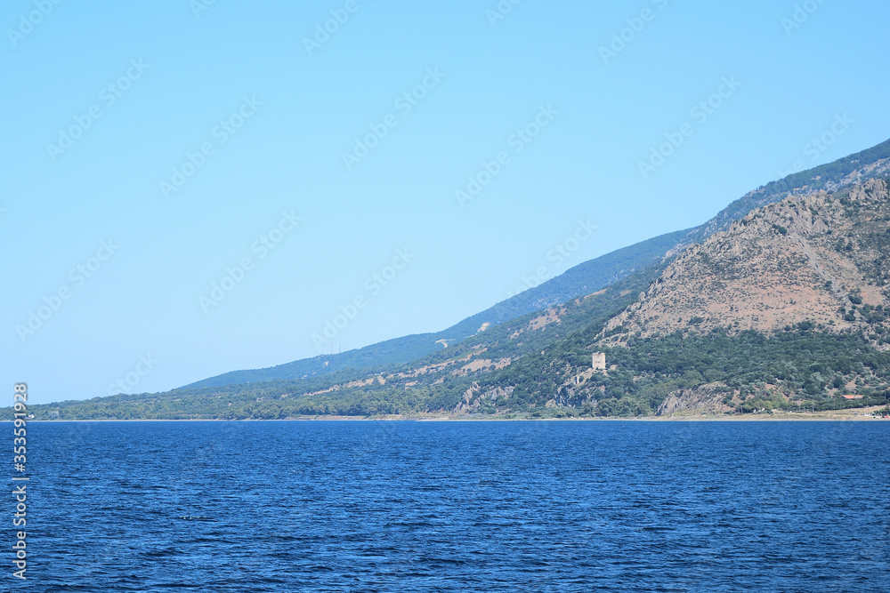 Seascape with Saos mountain and coastline- medieval tower near Paleopoli - Samothraki island view fr