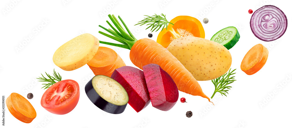 Falling mix of different vegetables isolated on white background