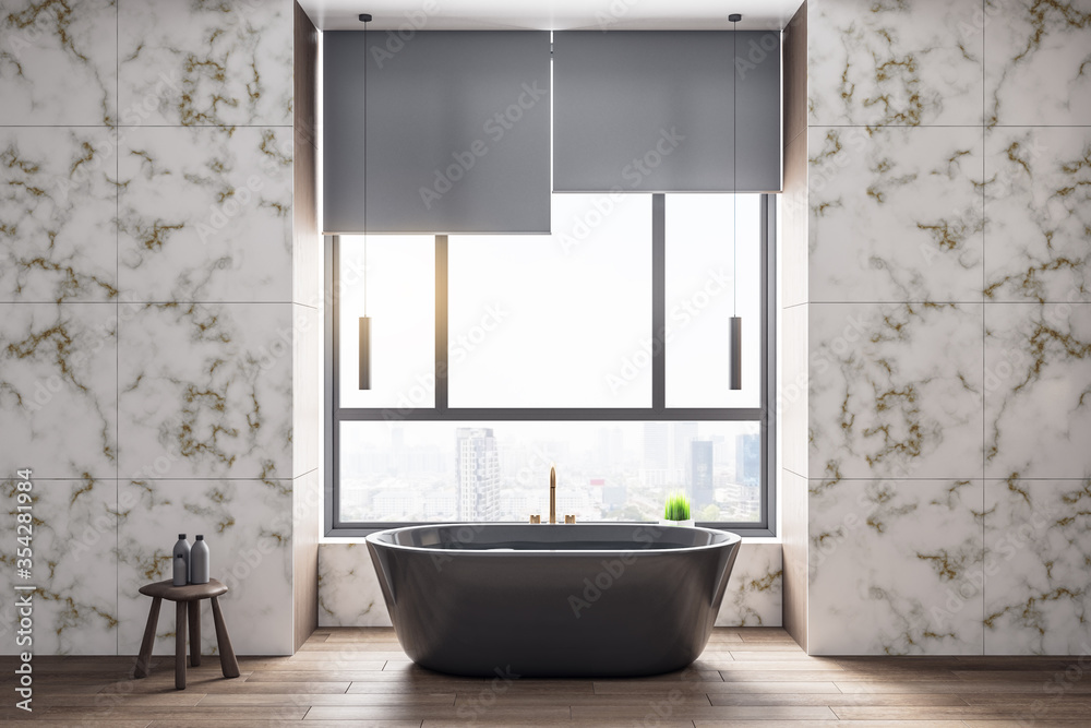 Contemporary marble bathroom interior with black bath