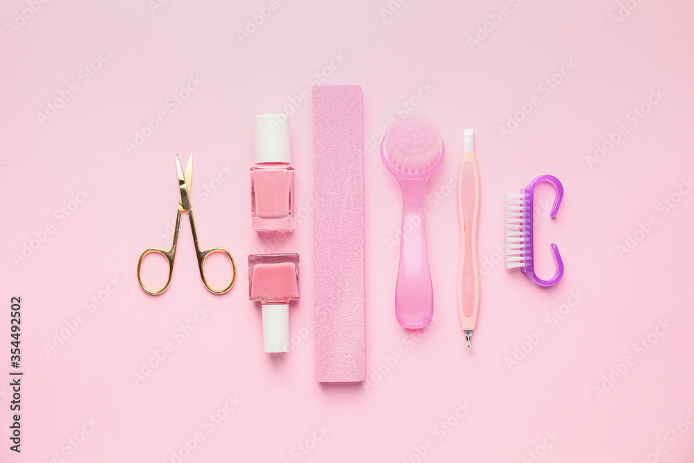 Supplies for manicure on color background