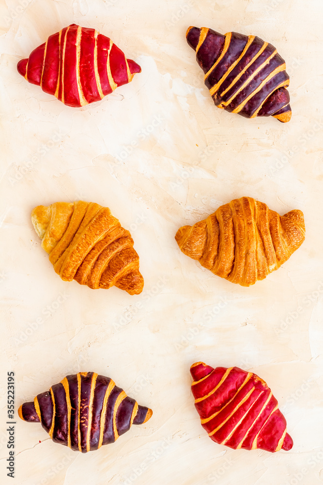 Croissants pattern - set of snacks on stone background