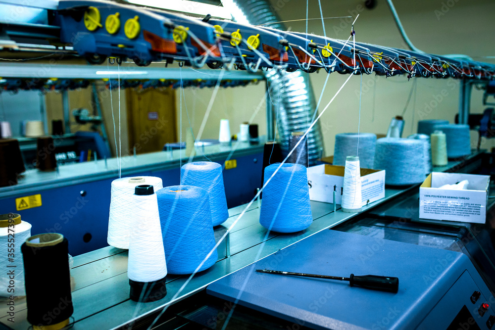 Equipment on the garment sewing factory. Manufacture of clothing and fabrics.