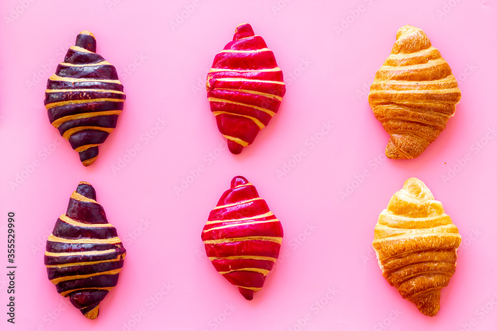 Croissants pattern - set of snacks on pink background