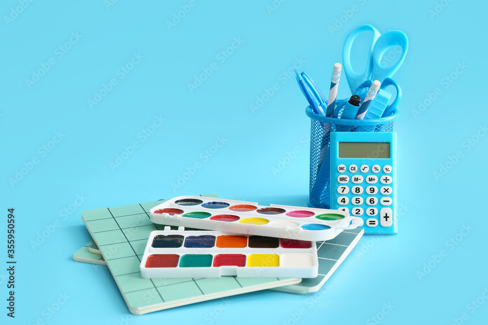 Set of stationery on color background