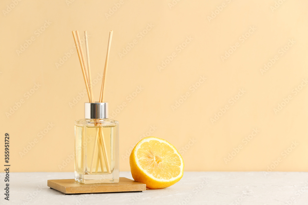 Citrus reed diffuser on table